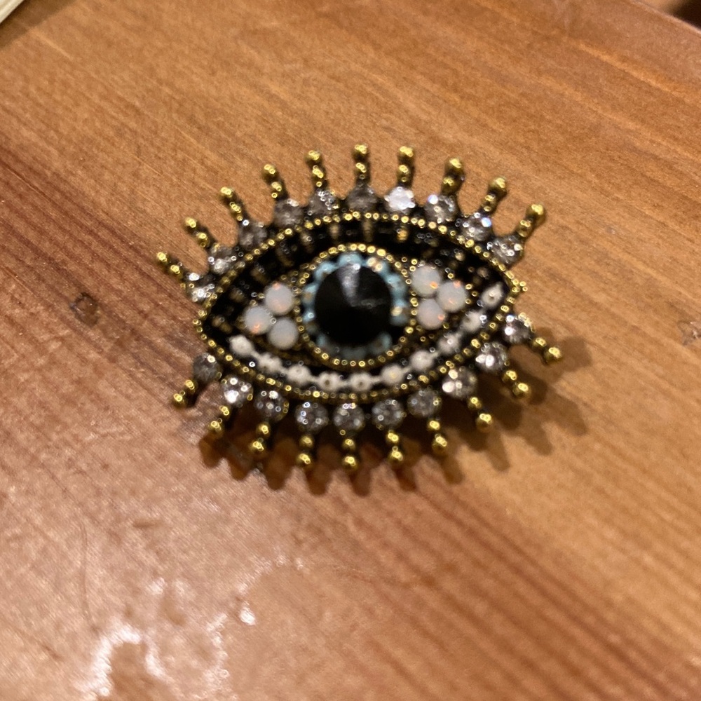 Gold and Black Eye Brooch